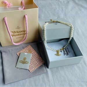 Vivienne Westwood White Pearl Necklace with Gold Charm
